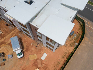 Drone Images of Commercial Building Roofs. TPO, Dome, Flat, White
