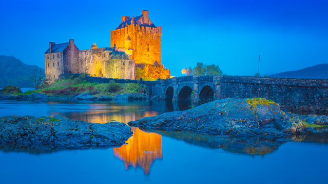 Scotland Eilean Donan Castle in a flood of blue color after sunset