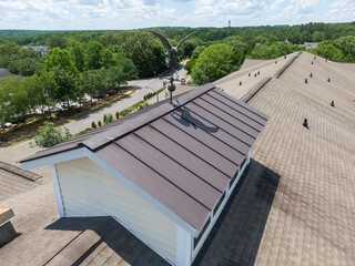 Drone Images of An Asphalt Shingle Roof on an Apartment Building on a Bright Sunny Day