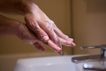 An automatic hand soap dispenser creates foam, promoting hygiene and cleanliness
