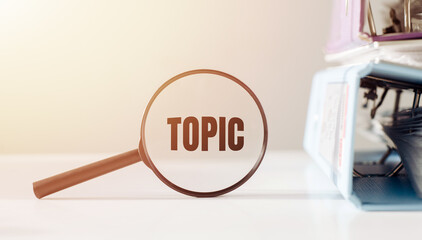 Magnifying Glass With the Word Topic