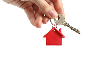 Real estate agent holding house key with trinket on white background, closeup