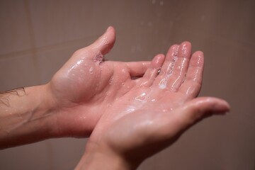 Fototapeta premium To maintain good hygiene and health, individuals cleanse their hands using water