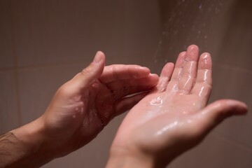 To maintain good hygiene and health, individuals cleanse their hands using water