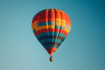 Obraz premium Hot air balloon flying sky blue background