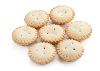 Mini berry confiture pies isolated on white