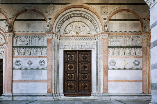 Romanesque Facade and main door of St. Martin Cathedral in Lucca, Tuscany. It contains most precious relic in Lucca, Holy Face of Lucca (Italian: Volto Santo di Lucca)