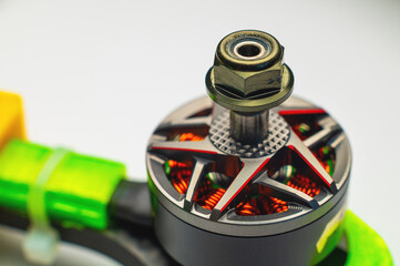 Close-up Small brushless electric motor for drone. Extreme macro photography.