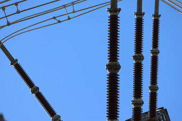 Power line details in extreme close-ups against a clear blue sky. Perfect illustrations for most things in the energy field.
