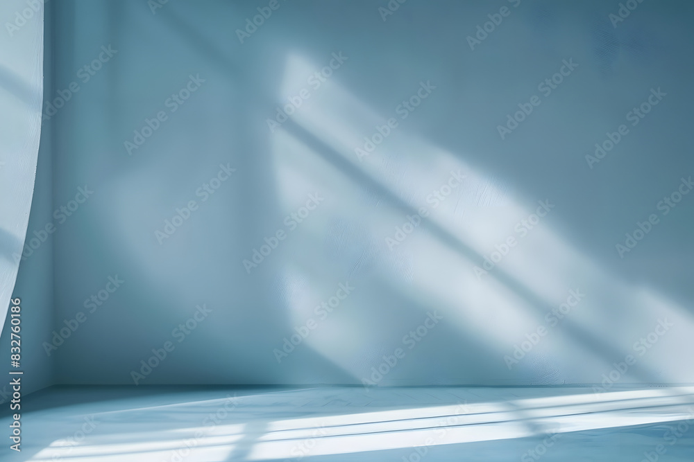 Wall mural minimal abstract simple light blue background for product presentation. shadow and light from window