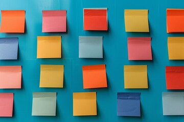 Colorful sticky notes on blue wall