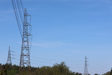 Power line pictures against a clear blue sky. Perfect illustrations for most things in the energy field.