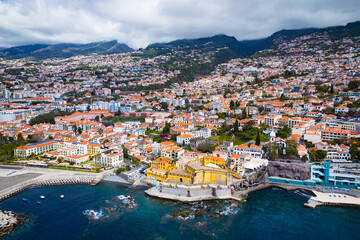 Funchal city of Madeira island Portugal with fortress on the coast of Atlantic Ocean. Aerial view