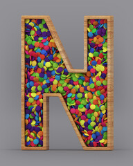 3d rendering of the English alphabet. Wooden letters with colorful candies