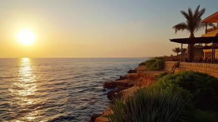 A rocky shoreline with a clear blue ocean in the background