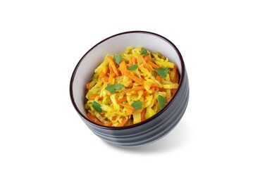 Cabbage and carrots thoran in a bowl on a white isolated background
