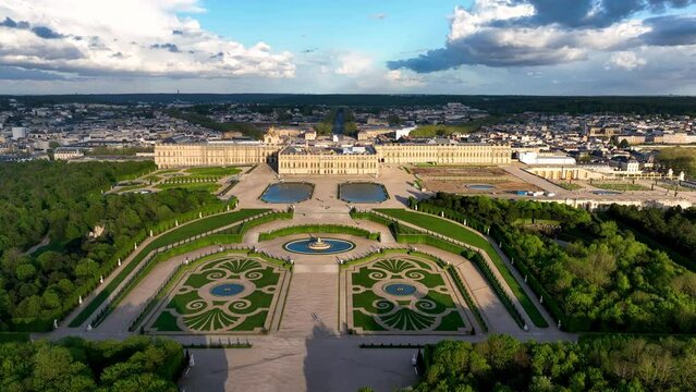 Aerial view of french castle, Palace of Versailles and landscaped gardens, near Paris. France.