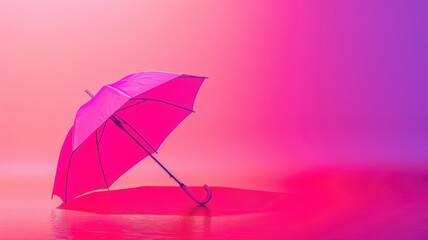 Pink umbrella against gradient background, creating surreal effect