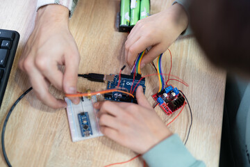 an engineer is engaged in the development and layout of electrical circuits