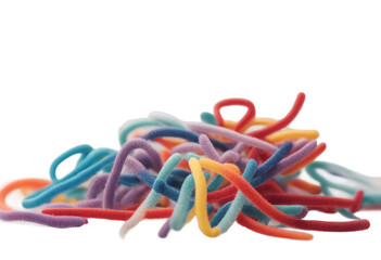 Twisted pipe cleaners in two tone twists isolated on white standing up like bar graphs