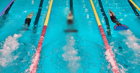 Finswimming World Championships. Aquatics monofin underwater sports. Athletes competing in blue...