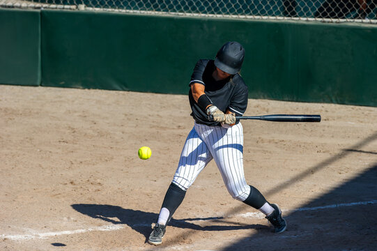 Softball Player Batting Swinging Fast Pitch Baseball Female College Sport Athlete