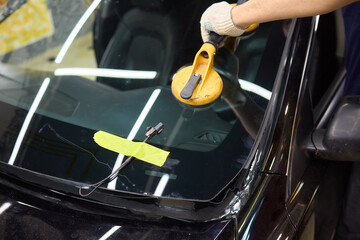 Installing windshield on a car with automotive design