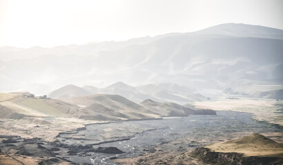 Panorama of mountains, hills and fields in the mountains of Tajikistan, spacious landscape for...