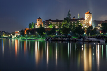 Twilight reflections of wawel castle in krakow