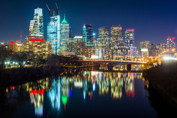 Nighttime cityscape with reflective river