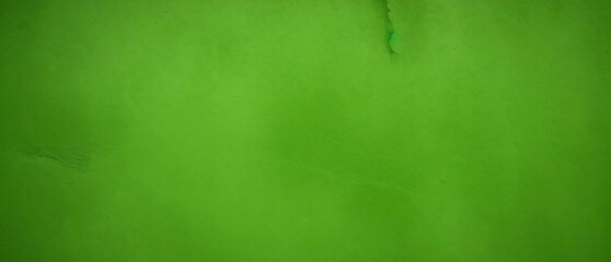 Obraz premium Black dark jade emerald green grunge background. Old painted concrete wall. Plaster. Close-up. Rough dirty grainy broken damaged distressed abandoned cracked. Or spooky scary horror concept. Design