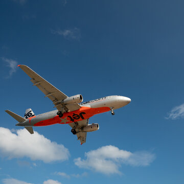 PHUKET, THAILAND - JANUARY 23, 2020: a Jetstar Asia Airbus A320-200 aircraft landing at Phuket International Airport.