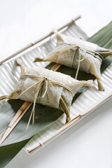 dragon boat festival dumplings in white background , chinese traditional food, chinese traditional festival ，duan wu festival，Glutinous rice ball, zongzi
