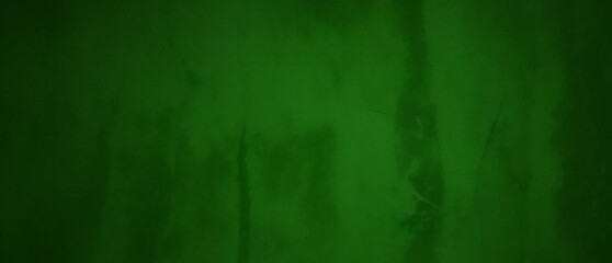 Obraz premium black dark jade emerald green grunge background old painted concrete wall plaster close up rough dirty grainy broken damaged distressed abandoned cracked or spooky scary horror concept design