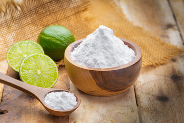 Baking soda and lime on a wooden surface