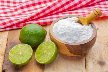 Baking soda and lime on a wooden surface