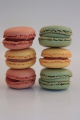 Macarons in yellow, pink and green