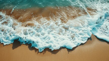 Fototapeta premium Beach and ocean Waves crash on the sandy beach