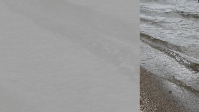 Video of Silvery Ripples of Water Breaking at the Sandy Pebbly Lakeside Shoreline - Border, Frame, Background, Template - Serene - Peaceful -