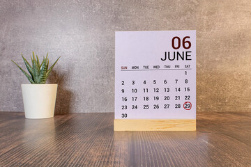 29 june wooden calendar in white background