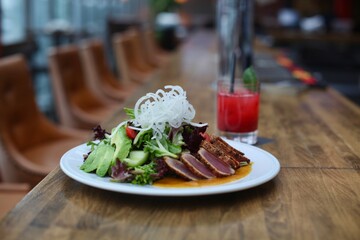 grilled salmon steak with salad