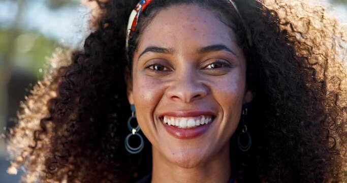 Portrait, outdoor and black woman with smile, face and wind on hair, confidence and haircare for spring. Bokeh, happiness and person with band for hairstyle, breeze and air on model in Brazil