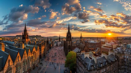 Obraz premium Panoramic view of a historic European city, cobblestone streets, quaint buildings, and a towering cathedral against a sunset sky