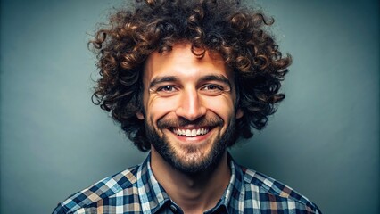 Portrait of a cheerful man with curly hair