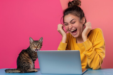 Fototapeta premium Happy White Woman Working on Laptop with Cat in Bright and Colorful Home Office