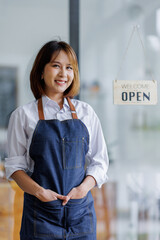 Startup successful small business owner sme beauty girl stand with tablet smartphone in coffee shop...