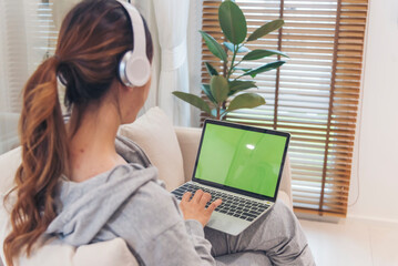 Empty Green Screen laptop Blogger Woman hands typing Laptop computer keyboard. Close up women hands...