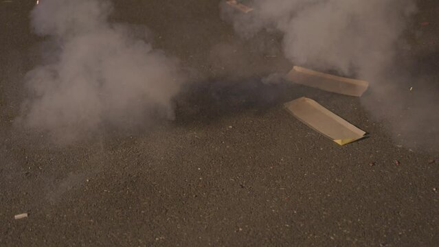 bomb fireworks burning by kid during the Diwali festival celebration at night