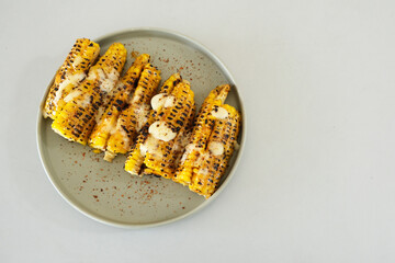Roasted corn with barbecue sauce and mozzarella cheese
