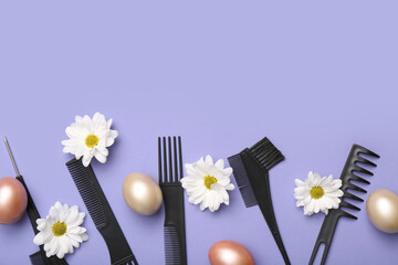 Hairdressing accessories with daisies and Easter eggs on lilac background